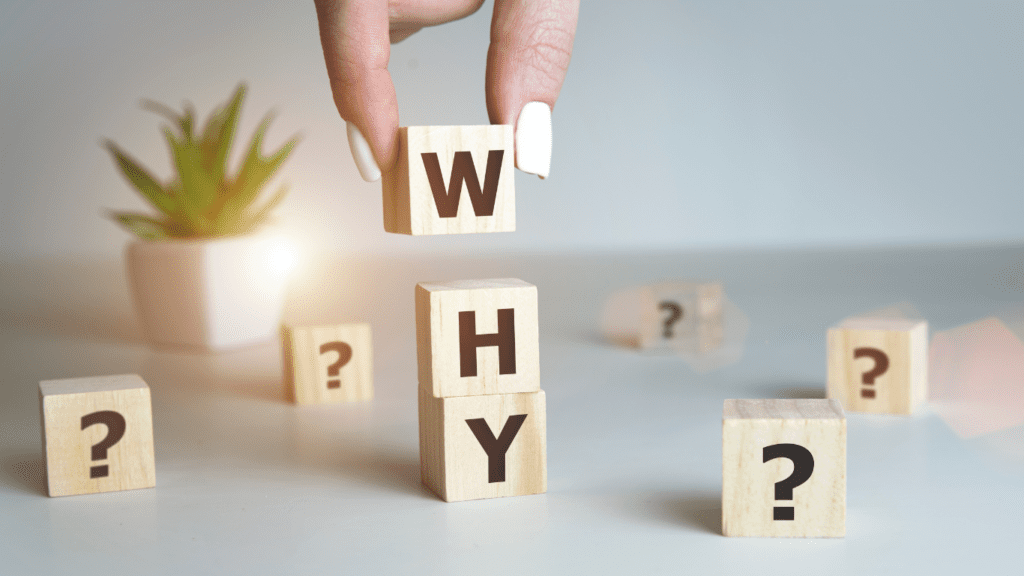 An image showing blocks spelling out the word why