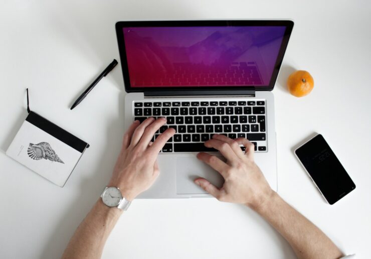 person using laptop computer